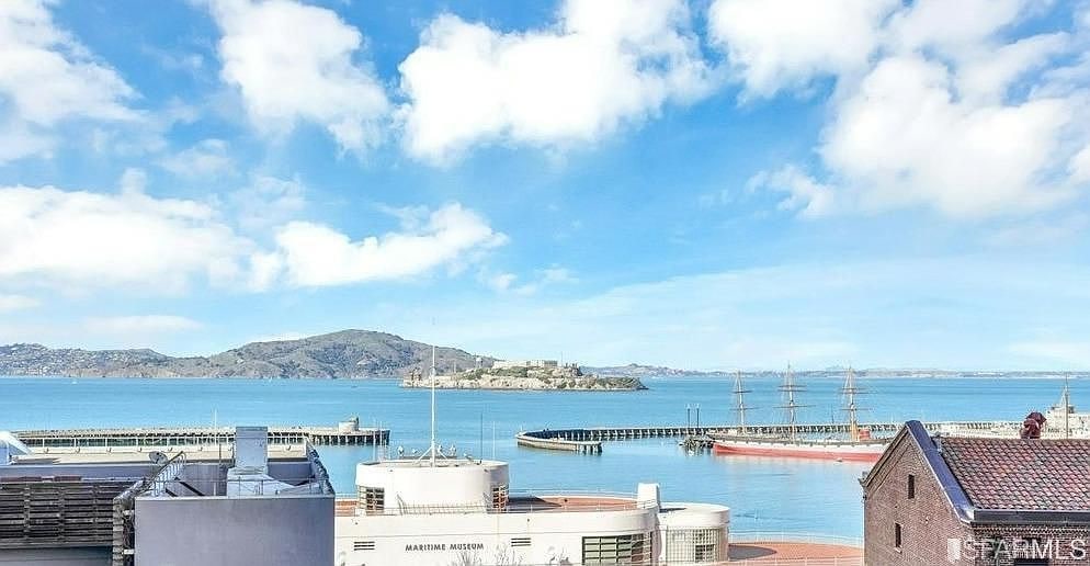 Bay outlook from Residence 301 with water, Alcatraz, and the northern waterfront in the historic listing photo